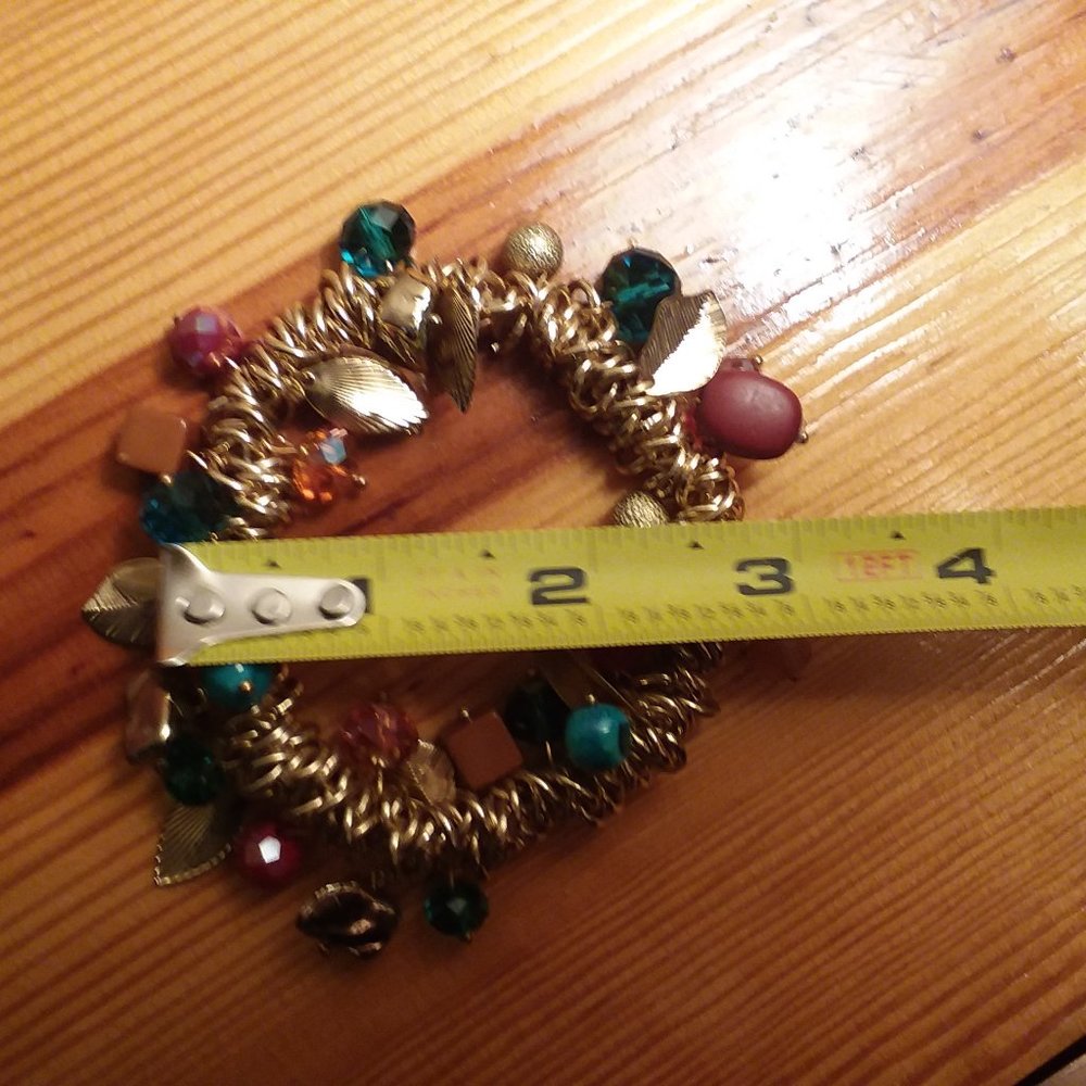 Gold stretch bracelet with charms - Picture 4 of 5